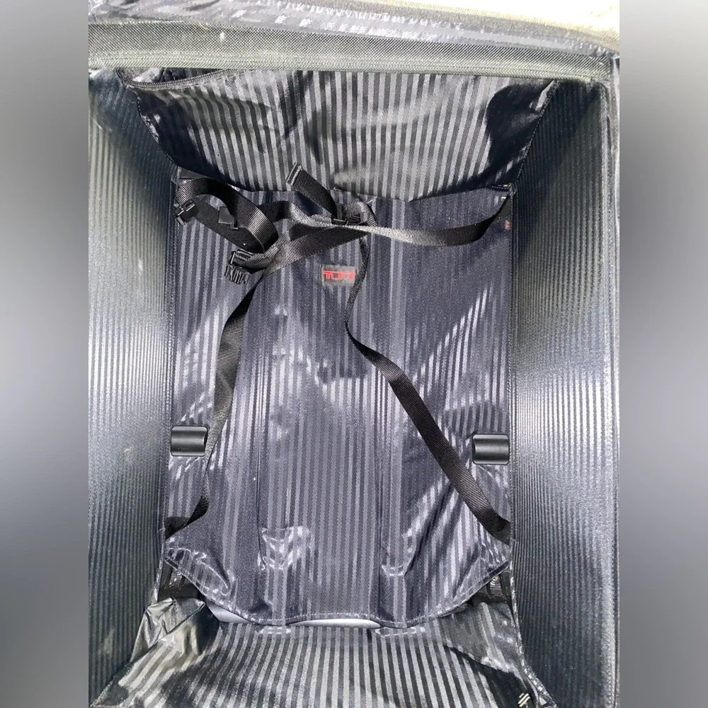 TUMI Check On Suitcase